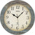 Funk-Wanduhr mit blau-grauem Ziffernblatt, römischen Ziffern, AMS-Logo und Zeigern