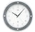 Funk-Wanduhr mit grauem Rand, weißem Ziffernblatt, applizierten Zahlen und schwarzen Zeigern