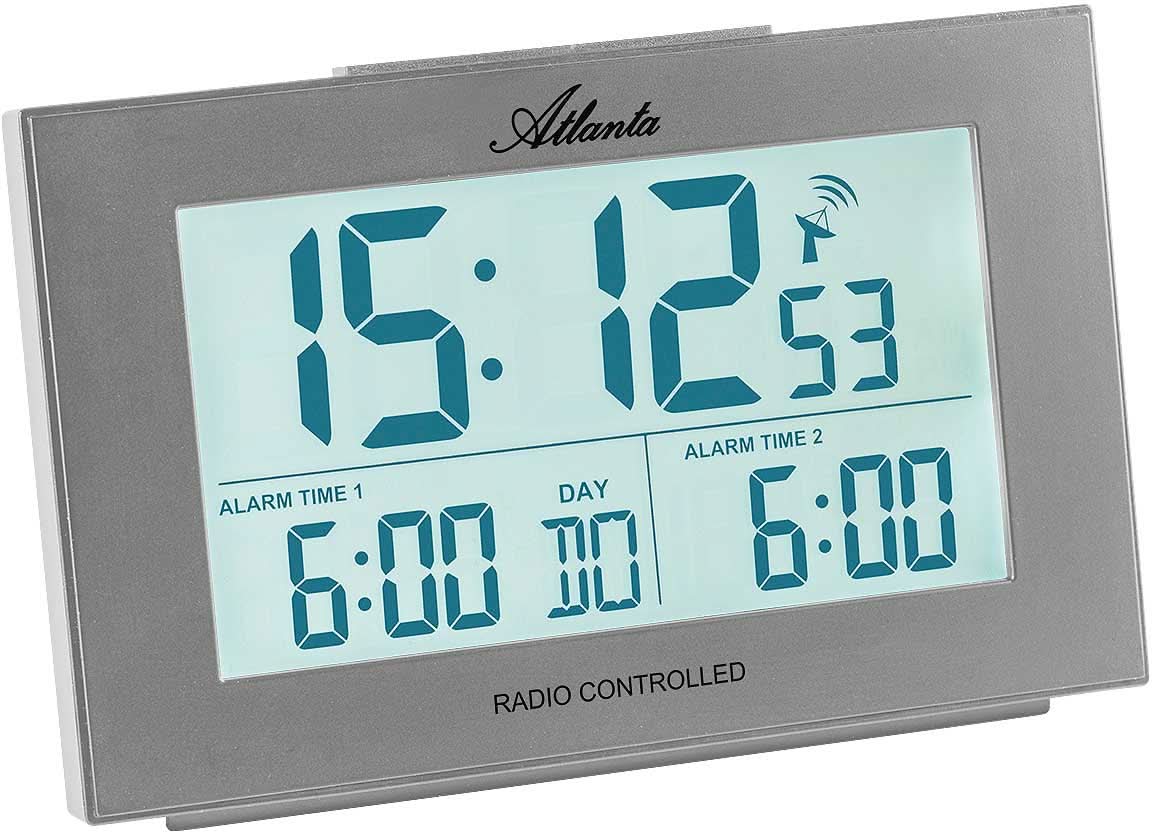 Sveglia digitale con display LCD blu, cassa grigia e indicatori di allarme