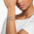 Bracciale charm con ciondoli multipli, tra cui un pattino e una pietra blu
