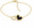 Bracciale color oro con due ciondoli a forma di cuore, cuore nero con scritta Hilfiger.