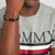 Tommy Hilfiger Lederarmband am Handgelenk: schwarzes Leder, Knoten-Clip, Flaggen-Detail