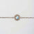 Bracciale color rame con ciondolo rotondo in madreperla blu in cornice filigranata