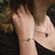 Bracciale Opaco con Ciondolo Rotondo in Legno - Modello Nucleo in Legno: Jewelry