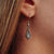 Orecchini Daydreamer con pietra sull'orecchio, goccia color argento con pietra scura