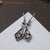 Orecchini Daydreamer con pietra, montatura a goccia color argento con pietra interna scura