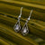 Orecchini Daydreamer con pietra, pendenti a goccia color argento con pietra scura
