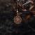 Orecchini con ciondolo a fiocco di neve color oro e pietra decorativa viola