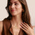 Ciondolo Charm, numeri angelici 888, con pietre preziose bianche, in argento, placcato oro - Thomas Sabo Modello: CC1255-414-14