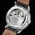 Orologio da uomo con movimento a vista, cassa in argento e cinturino in pelle nera