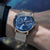 Orologio Naos Mondphase con quadrante blu e cinturino in pelle marrone