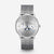 alt
Orologio Naos Moon Phase con quadrante argentato e cinturino Milanaise argentato, visto frontalmente su sfondo grigio.