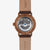 Orologio da uomo retro: movimento a vista, cinturino in pelle marrone, fondello color bronzo.