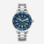 Orologio Marus 2.0 Edition, cassa in metallo color blu scuro opaco, cinturino in metallo argentato, vista frontale su sfondo grigio.