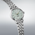 Orologio automatico con quadrante verde menta e cinturino in acciaio inossidabile argentato, vista 3/4