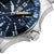 Orologio da uomo con quadrante blu e cassa, corona e pulsanti in argento