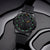 Orologio da uomo Luminox con quadrante nero e indici verdi luminescenti, datario (3).