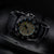 Orologio da uomo con cassa nera, quadrante beige e indici luminescenti
