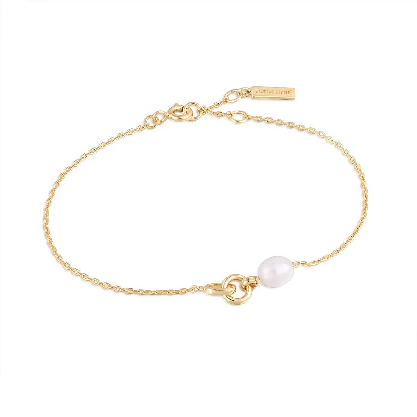 Bracciale color oro con ciondolo a perla su catenina delicata