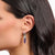 Orecchini a cerchio con pendente in ametista e catena - Thomas Sabo Modello: CR722-643-13