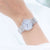Orologio da donna Citizen Eco-Drive al polso, cinturino argentato, quadrante azzurro