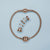 Bracciale a maglie in acciaio inossidabile con chiusura in oro rosa e charm singoli