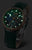 Orologio da donna Vostok Europe con cinturino in pelle verde, cassa rotonda e indici luminescenti