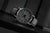 Orologio da uomo Mondaine stop2go con quadrante bianco, cassa grigia e cinturino in pelle grigia.