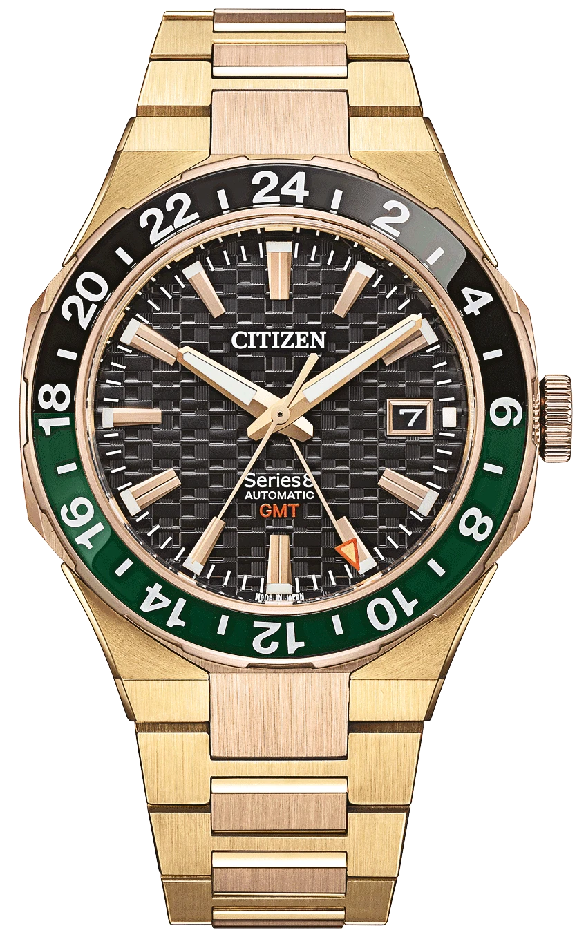 Herrenuhr mit goldfarbenem Gehäuse, schwarzem Zifferblatt und grünem GMT-Lünette