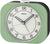 Sveglia classica Seiko con cassa in plastica verde, quadrante bianco rotondo e lancette analogiche