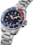 Orologio da uomo: quadrante blu, lunetta rossa/blu, lunetta subacquea seghettata, cinturino in acciaio