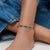 [
  {"alt": "Cavigliera da donna SoLIVER SOJ-0168-A-27 in argento 925 rodiato con zirconi bianchi"}
]