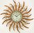 Wanduhr mit goldfarbenem Sonnen-Design und rundem Ziffernblatt