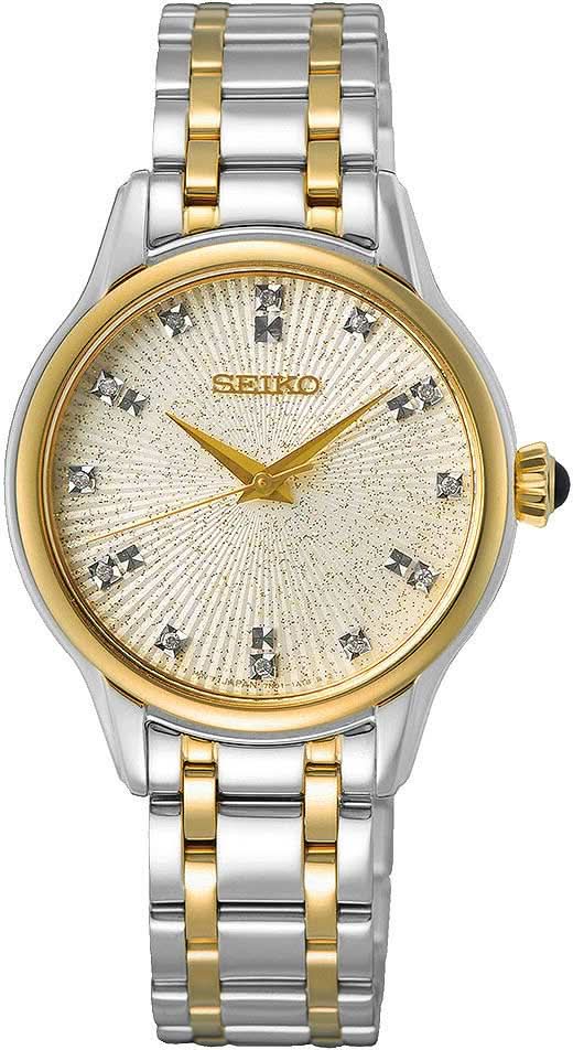 Orologio da donna con cinturino in metallo bicolore, ghiera color oro e quadrante argentato fantasia