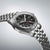 Orologio da uomo con bracciale in acciaio inossidabile, quadrante nero con accenti GMT rossi