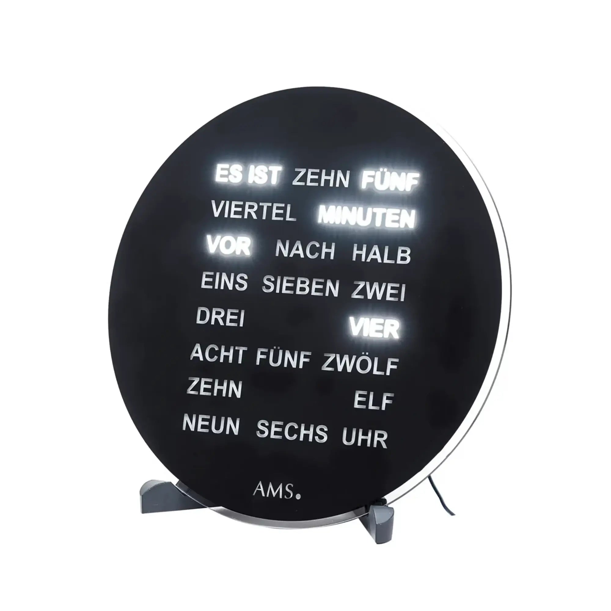 Schwarze runde AMS Uhr mit Textanzeigen auf dem Ziffernblatt und Stützfüßen