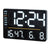 Orologio digitale con display a LED, nero, con indicazione del giorno e valori di temperatura e umidità.