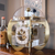 Orologio da tavolo con cupola in vetro, cornice in ottone e quadrante bianco