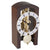 Orologio da tavolo con cornice in legno scuro, quadrante rotondo in vetro e movimento a scheletro a vista