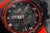 Orologio da uomo con quadrante nero, lunetta rossa e lancette luminescenti distintive