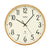 Orologio da parete con quadrante beige, numeri e lancette neri e cornice in legno chiaro.