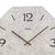 Quadrante di orologio da parete con numeri grandi, lancette nere e scritta AMS.