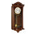 Orologio da parete in legno scuro con quadrante bianco e delicati ornamenti a pendolo