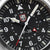 Quadrante nero per orologio da uomo con logo LUMINOX, accenti rossi e indici delle ore