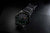 Orologio da uomo Luminox con cinturino nero e indici luminescenti verdi sul quadrante.