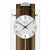 Wanduhr-Zifferblatt mit AMS.-Logo, schwarzen Zeigern und Pendel im Nussbaumgehäuse.
