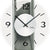 Wanduhr-Detail: Ziffernblatt mit schwarzen Stundenmarken, Facetten-Mineralglas, AMS.