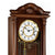 Quadrante di orologio da parete con numeri romani, bordo color oro e meccanismo a vista