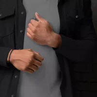 Bracciale in pietre preziose Larvikit nere da 6 mm con chiusura in acciaio inossidabile nero - Modello Rebel&Rose: RR-60117-V-M